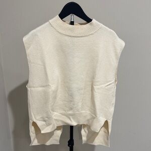 Cream Sleeveless Knit Sweater Vest with open back detail/bow